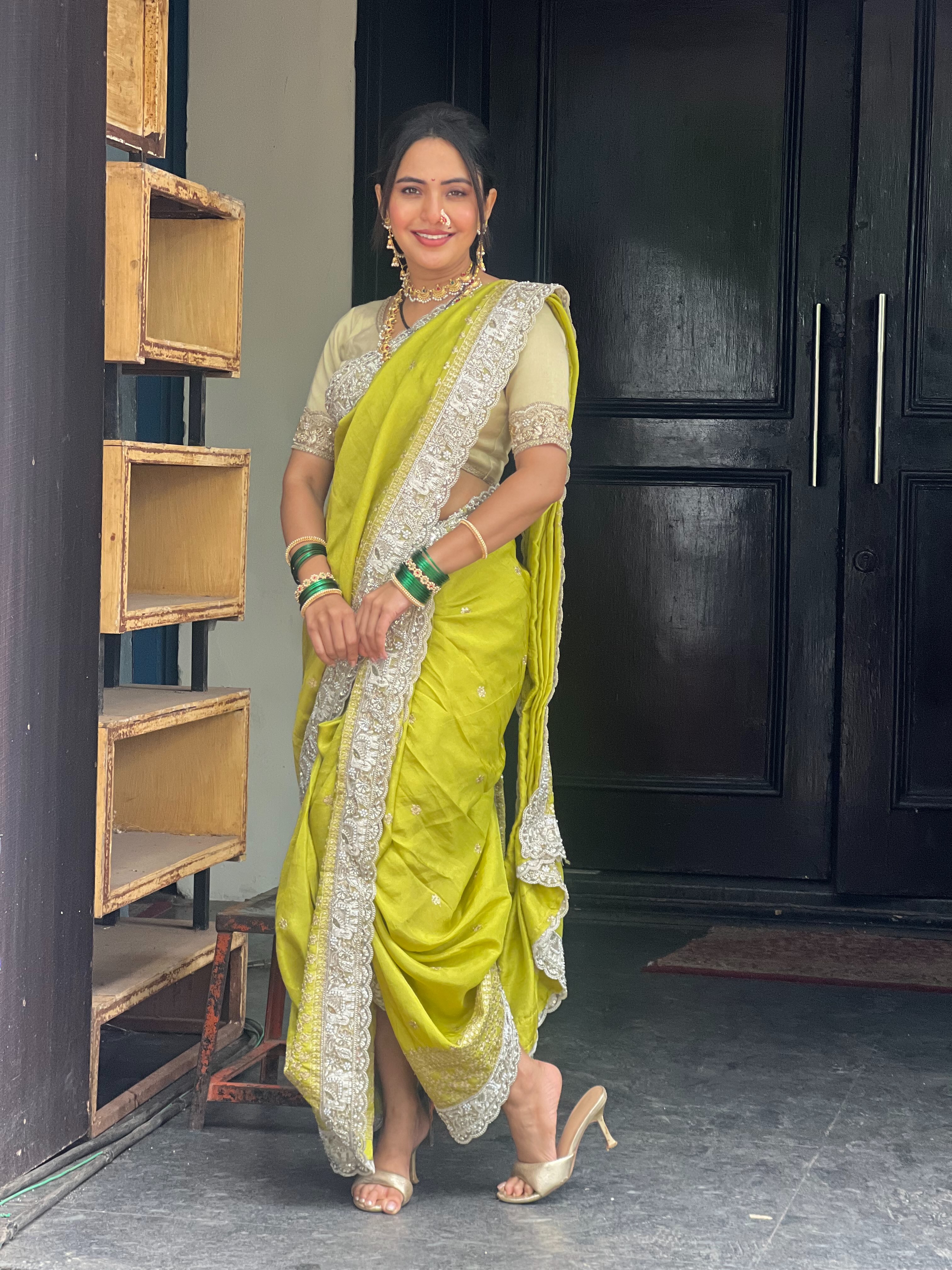 Anushka Sarkate Green Nauvari Saree Look