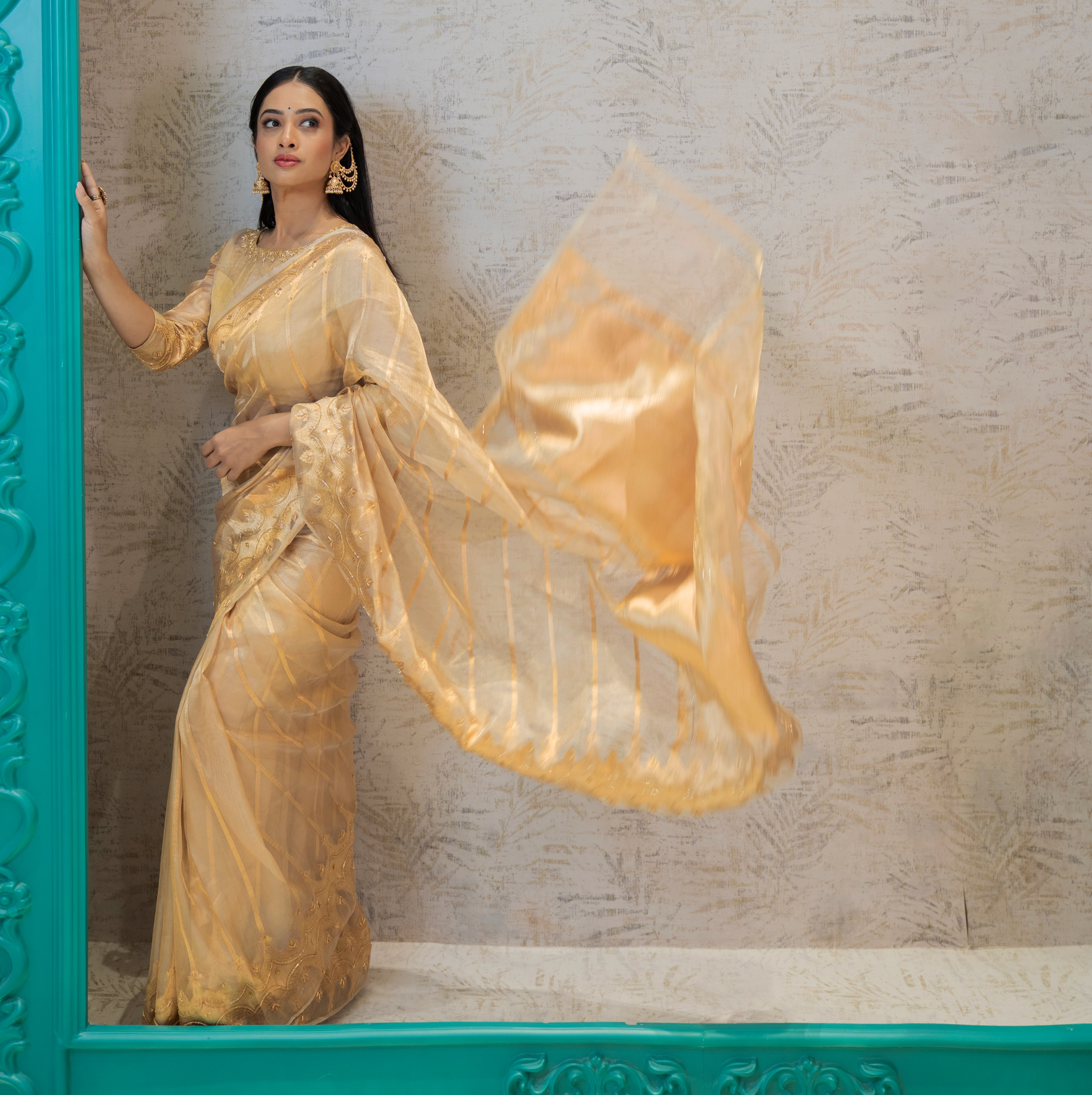 Girija Prabhu Golden Saree Look