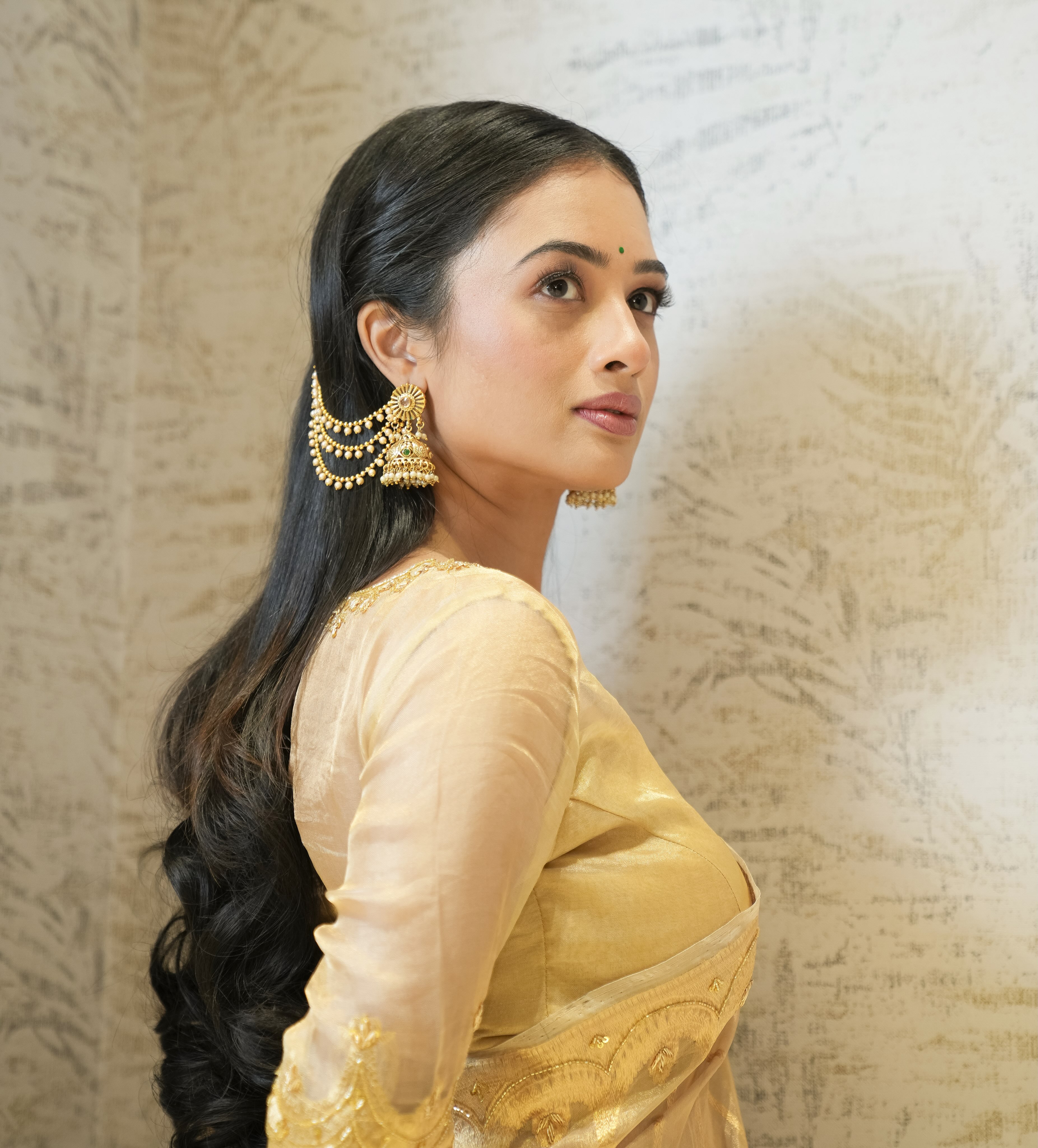 Girija Prabhu Golden Saree Look