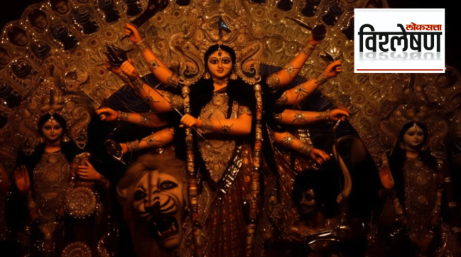 An intricately decorated idol of Goddess Durga holding traditional weapons in her multiple arms, flanked by other deities inside a illuminated festival pandal, with the "Loksatta Vishleshan" logo in the top right corner.