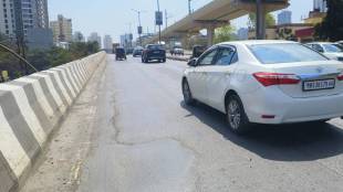 Thane Ghodbunder road flyover mastic asphalt bumps | Majiwada flyover dangerous road condition Thane | TMC Ghodbunder road accident risk news | Thane MSRDC MMRDA flyover road maintenance news
